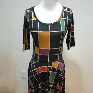 Size M. Lularoe Nicole dress. Looks new!